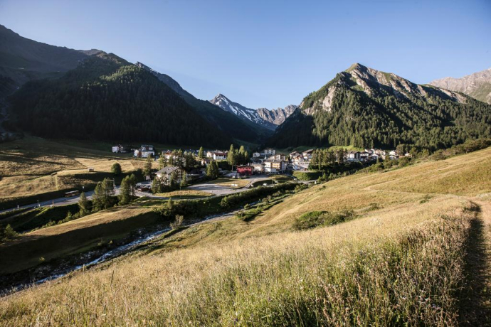 View over Samnaun towards Fuorcla Maisas and Muttler